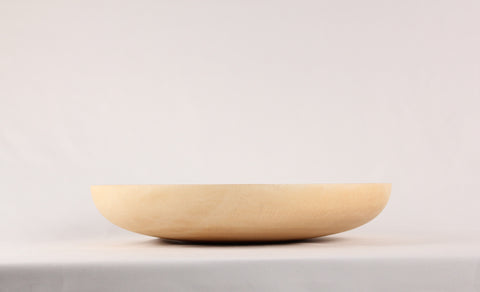 Side view of a mango wood plate